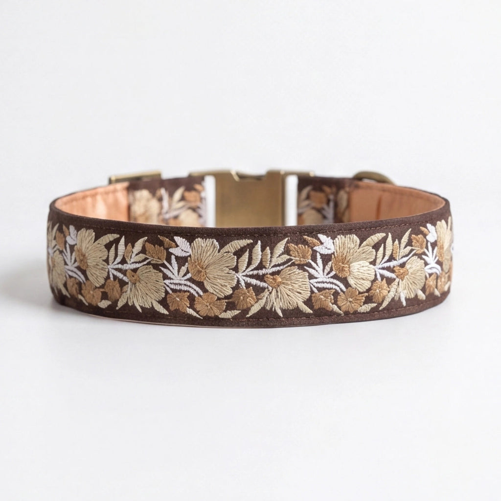 Floral embroidered dog collar on a white background