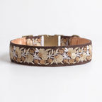 Floral embroidered dog collar on a white background