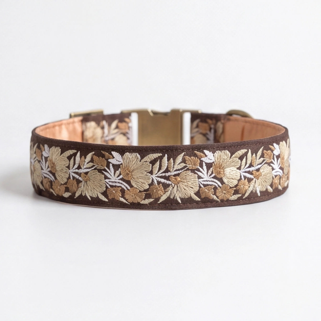 Floral embroidered dog collar on a white background