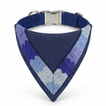 Blue and purple patterned dog collar on a white background